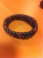 blauw/turquoise armband met roze strass steentjes